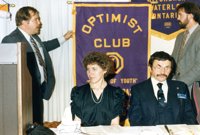 O.I. New Club Building V.P. Steve McDonald presenting the Club banner to President Larry Gingerich